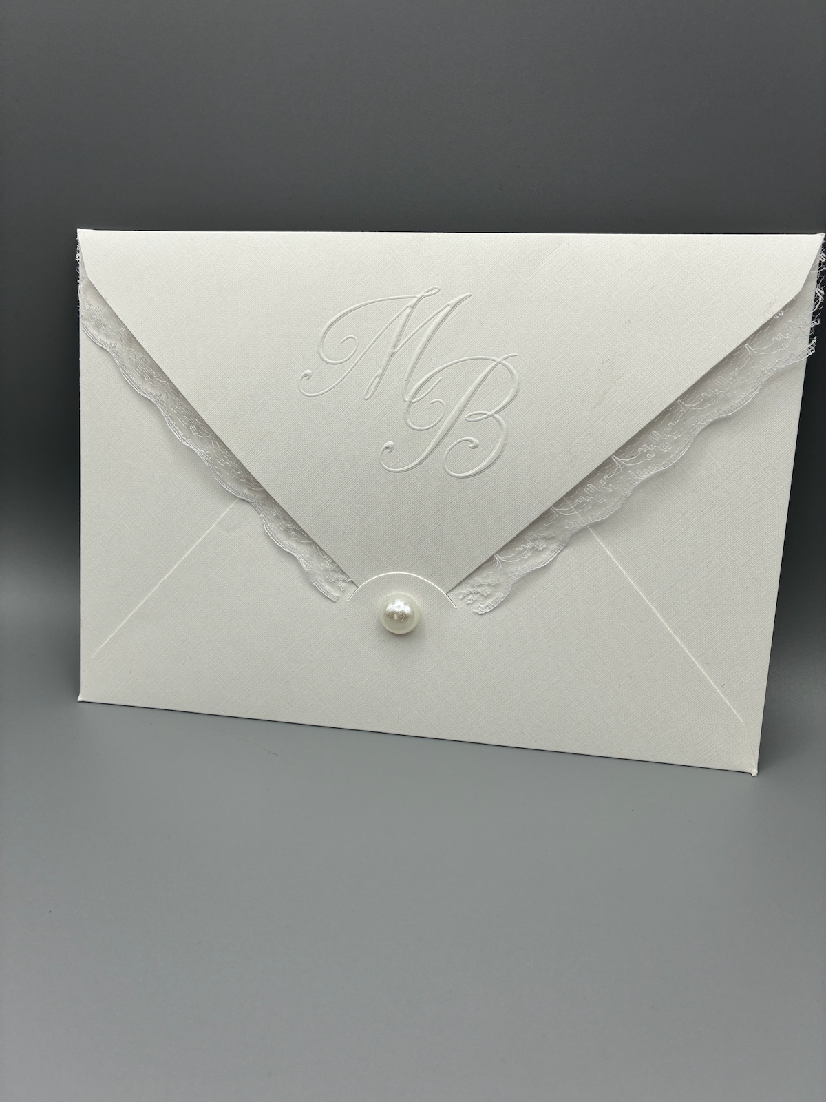 Wedding invitation "Luxe Minimal" with embossing and boho bow